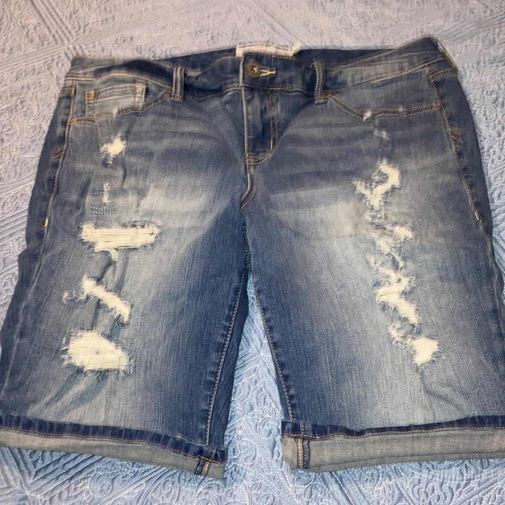 Woman’s Torrid distressed denim long shorts, size 14